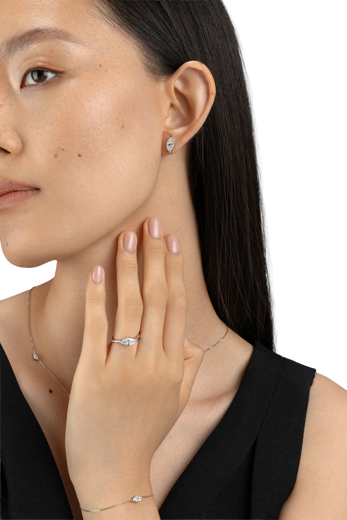 Model wearing Be True Leaf Earrings Model — product photo #Metal_White Gold