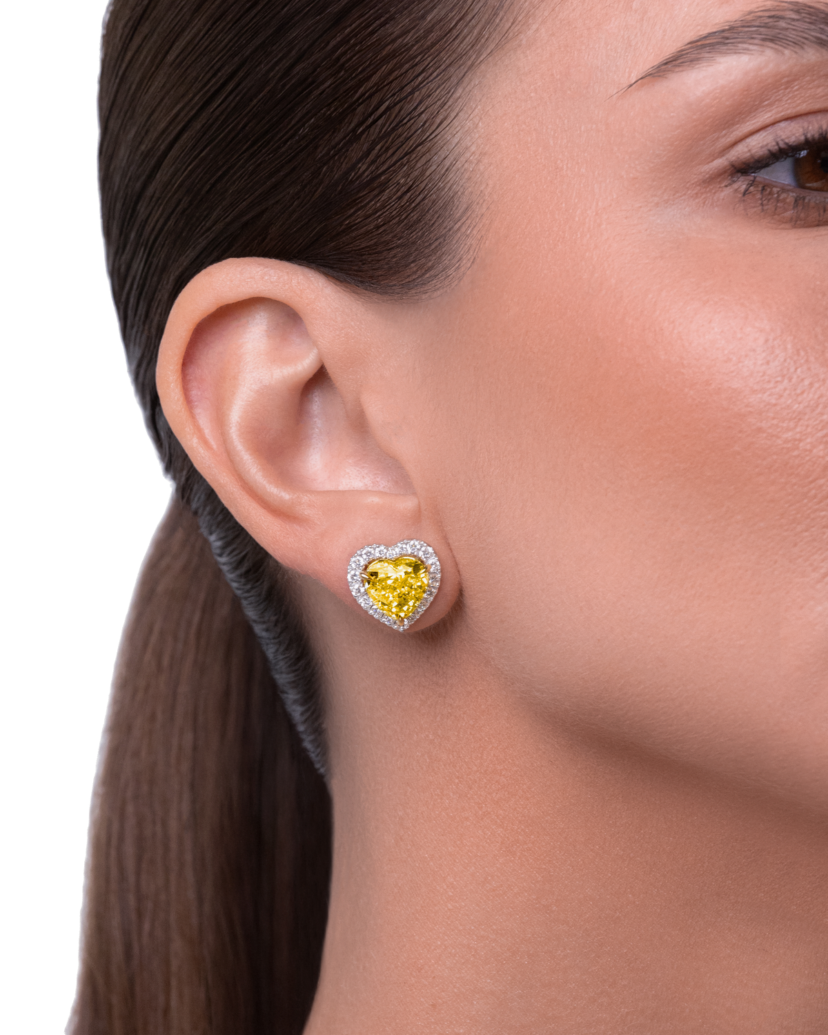 Always Be Heart Shape Fancy Vivid Yellow Diamond Earrings worn on model, halo attached #Metal_White Gold